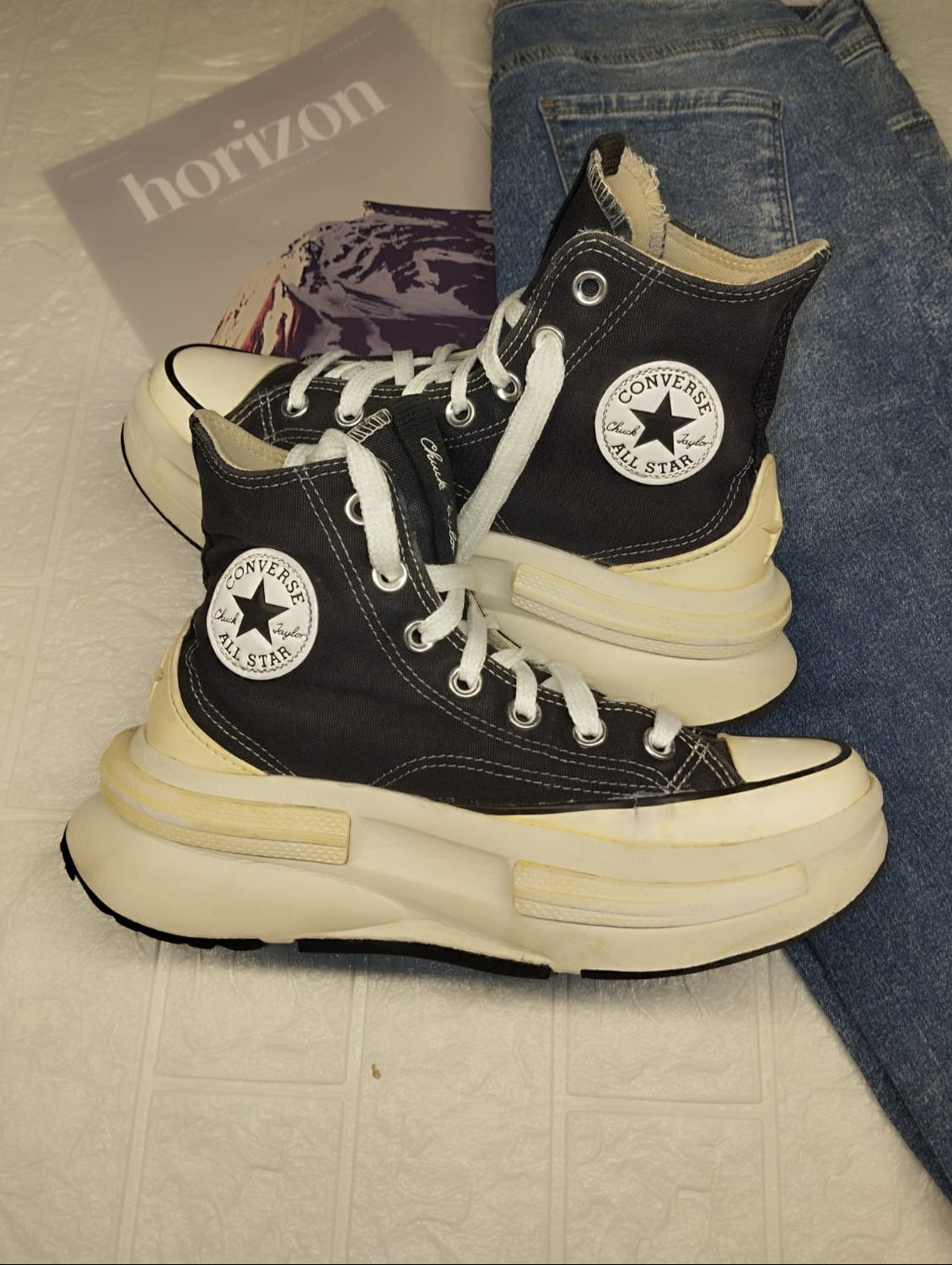 Black high rise platform