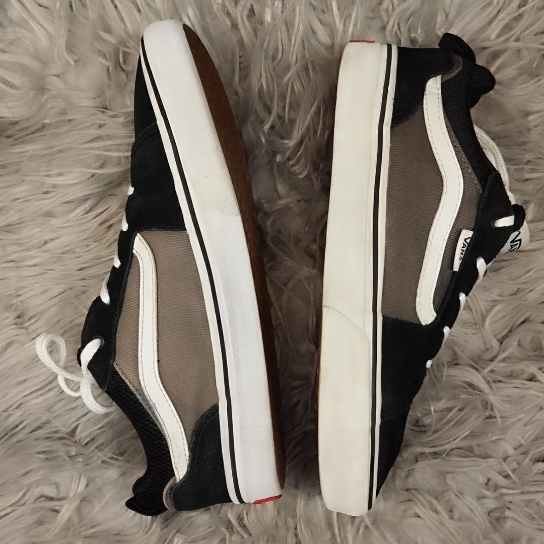 Black and beige low rise vans
