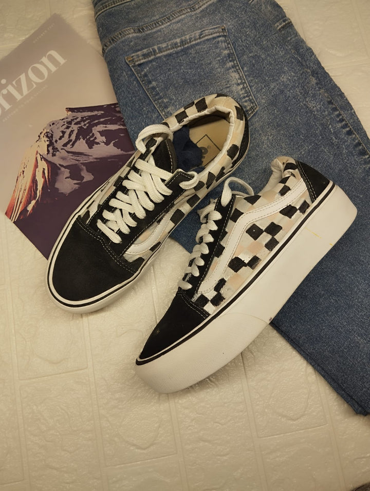 Black checkered print low rise platform vans