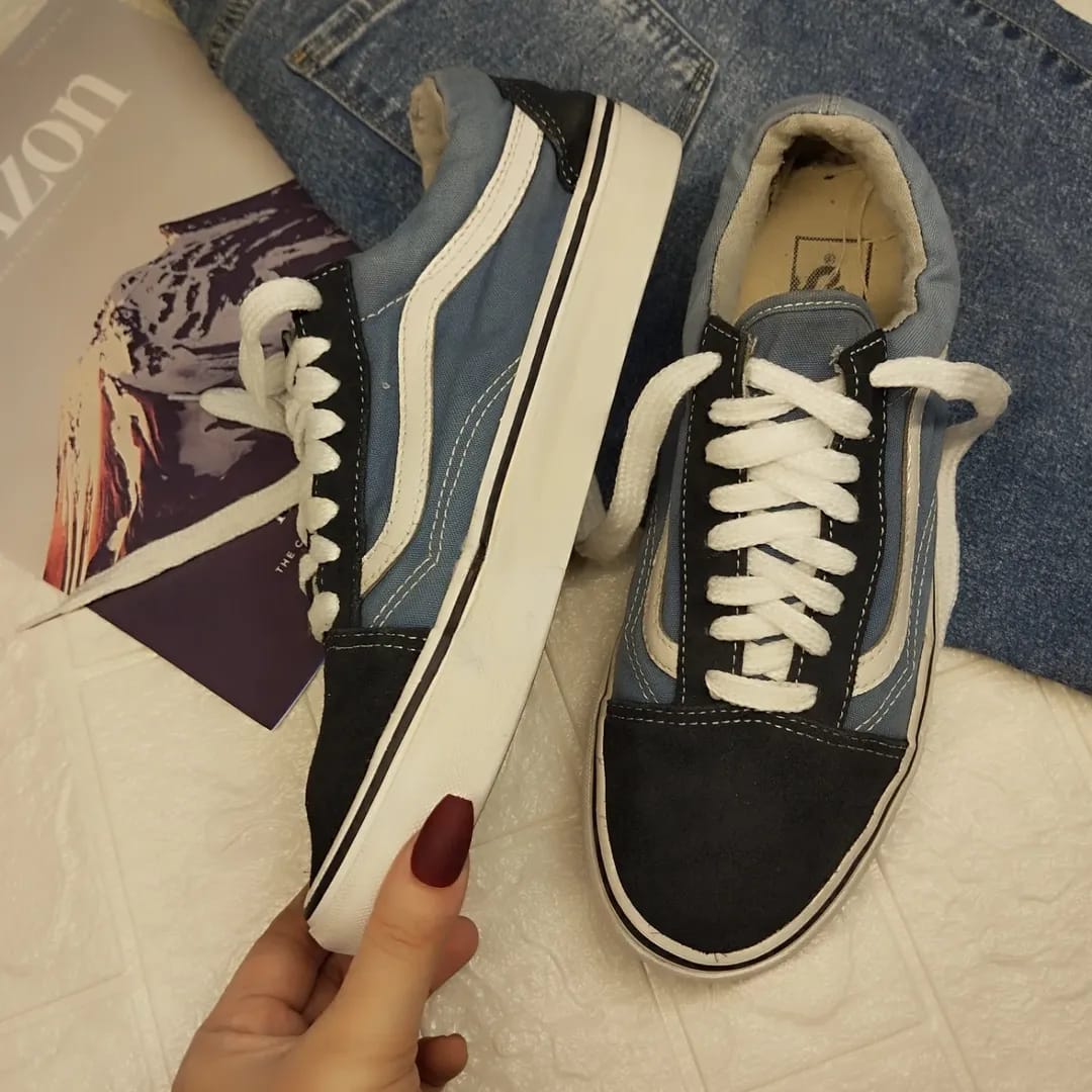 Black and blue low rise vans