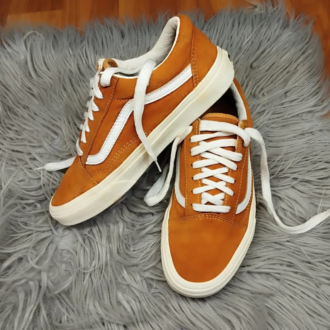 Orange low rise vans