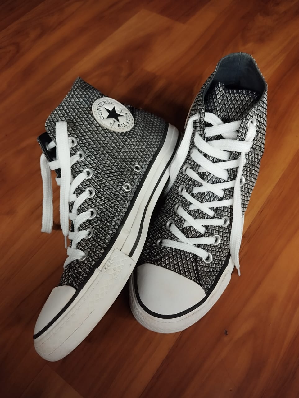 Black and white textured high rise converse
