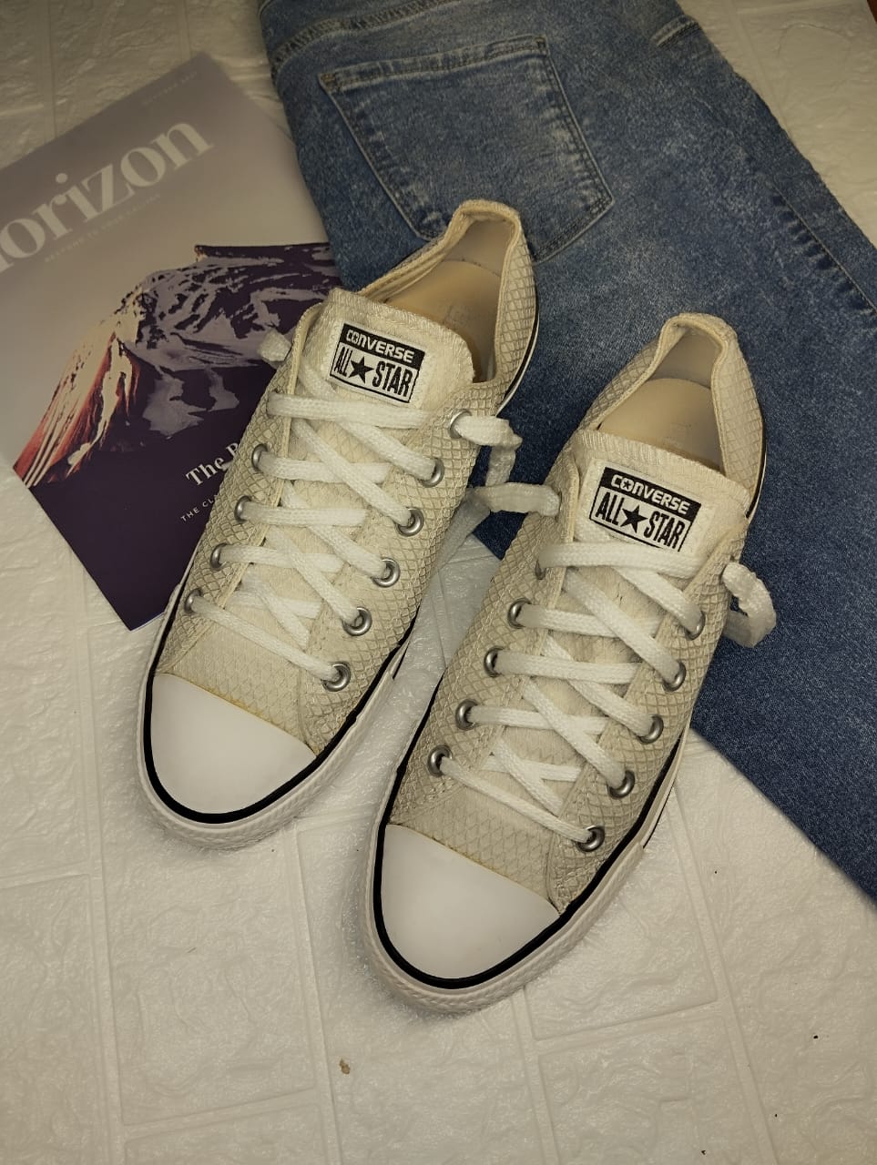 White textured low rise converse