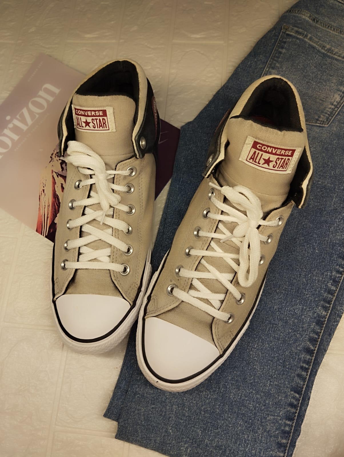 Beige and black ankle cut converse