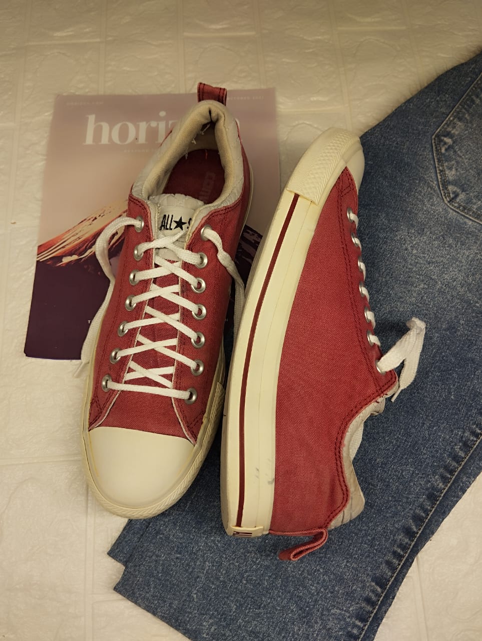 Red and beige low rise converse