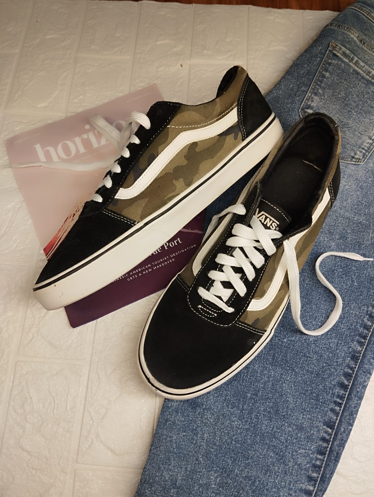 Black and brown low rise vans