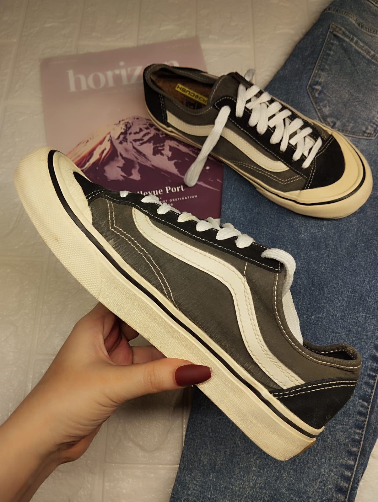 Grey and black low rise vans