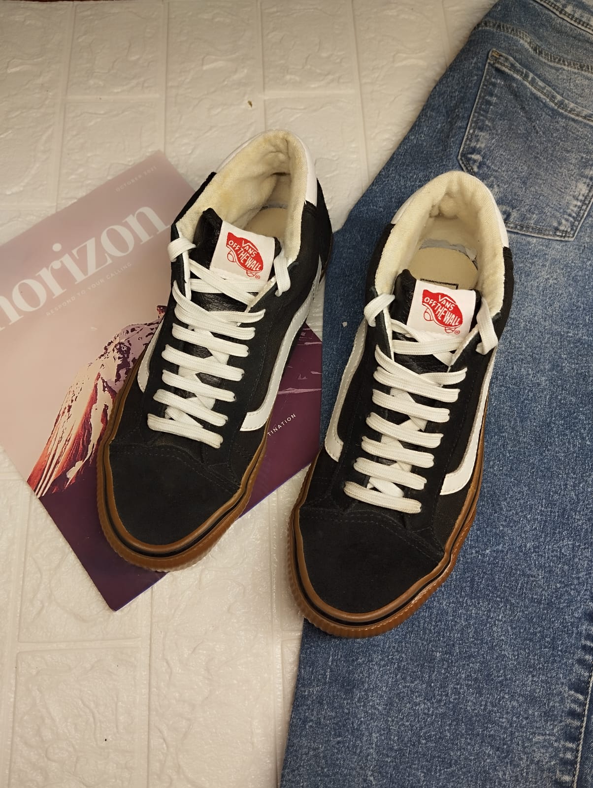 Black and brown ankle cut vans