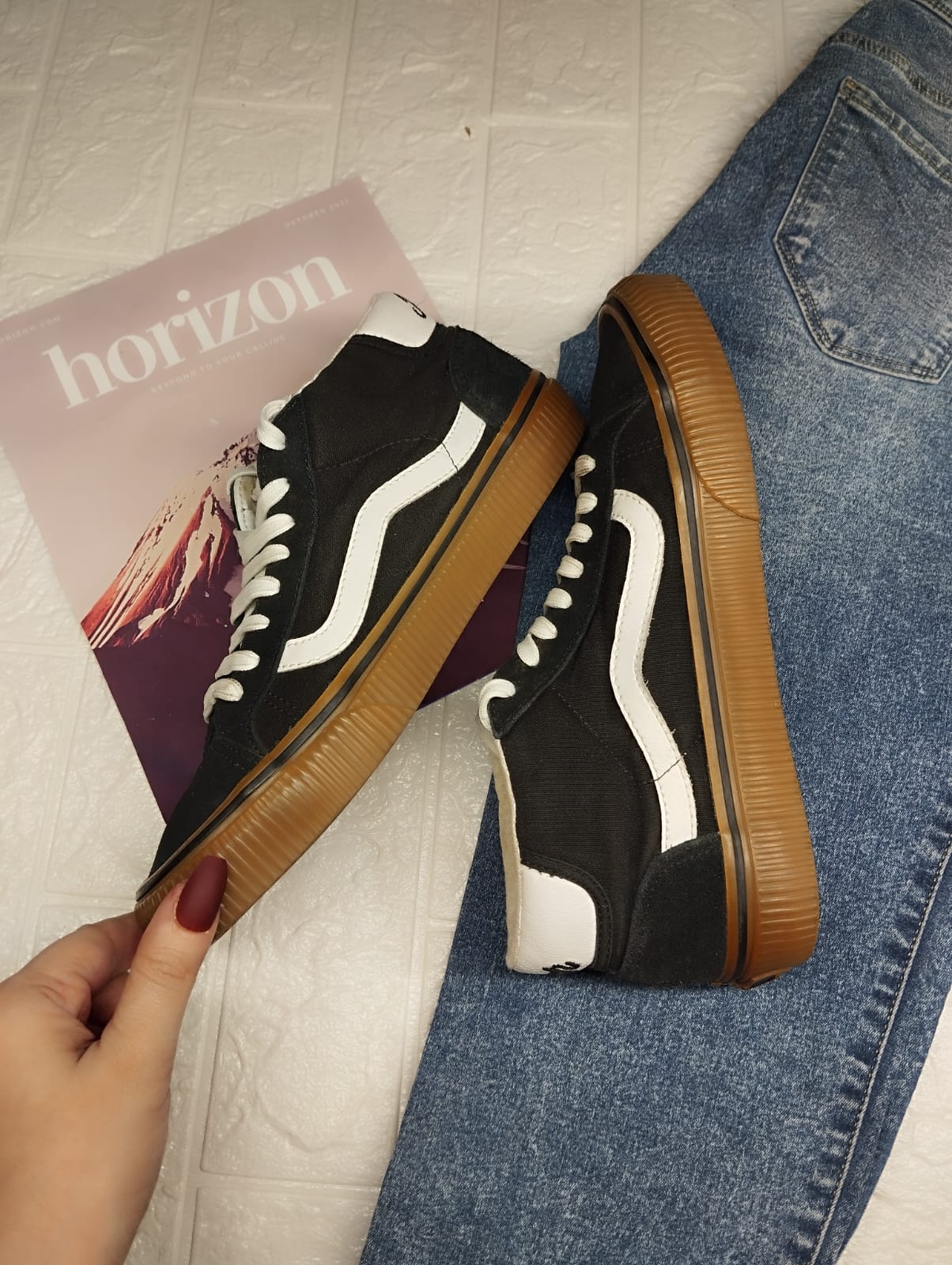 Black and brown ankle cut vans
