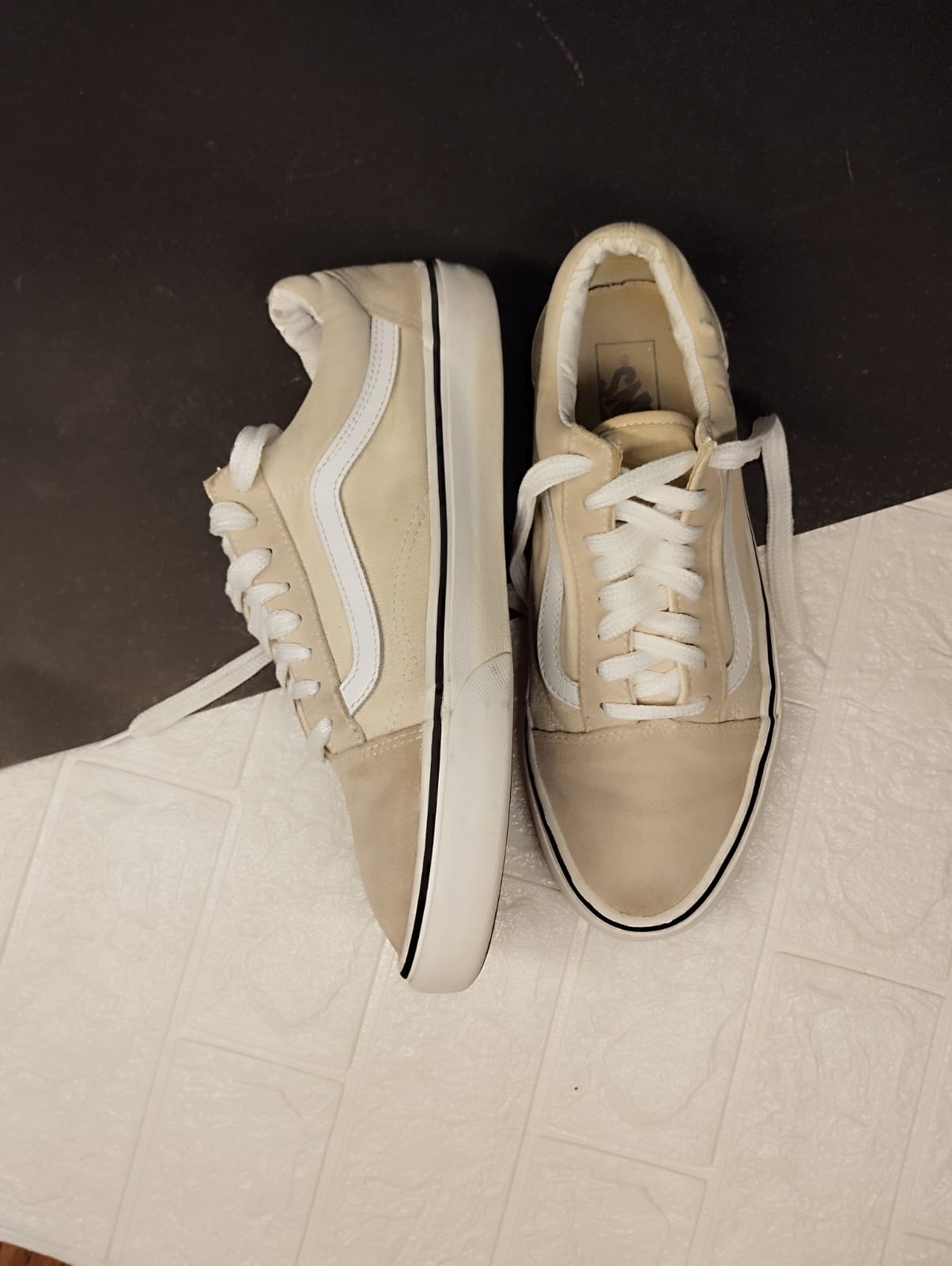 Beige low rise vans