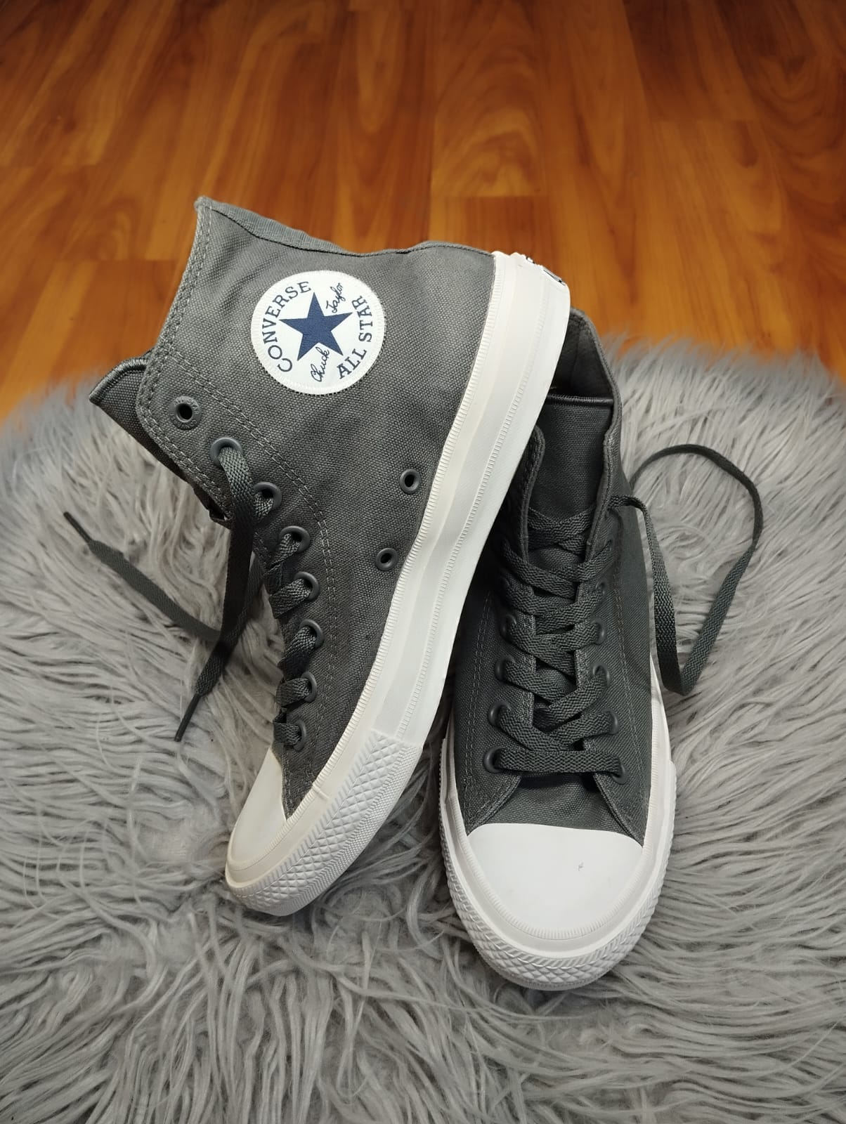 Grey and white high rise converse