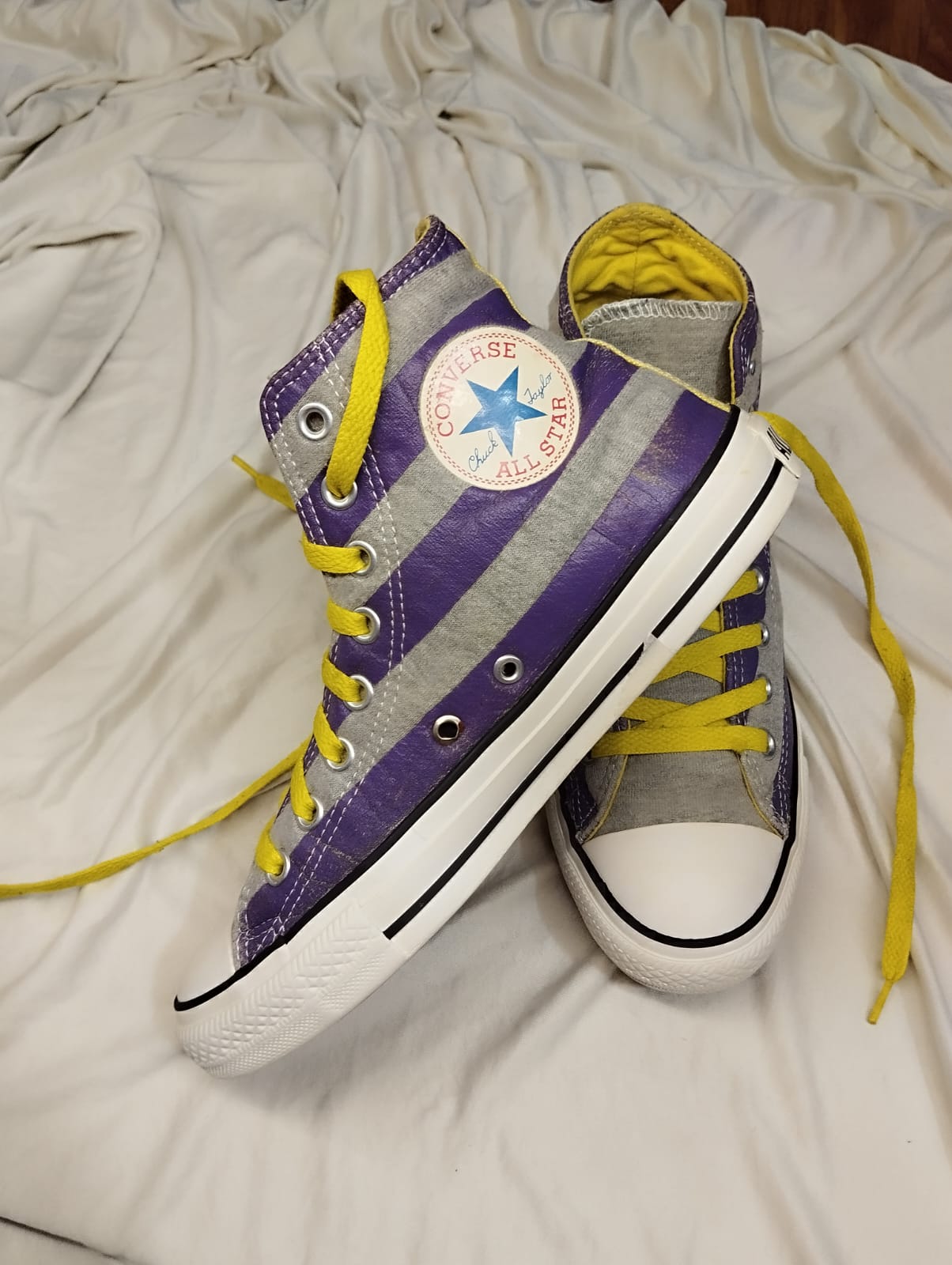 Grey and purple high rise converse