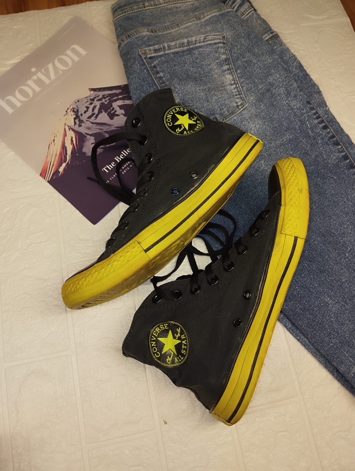 Black and yellow high rise converse