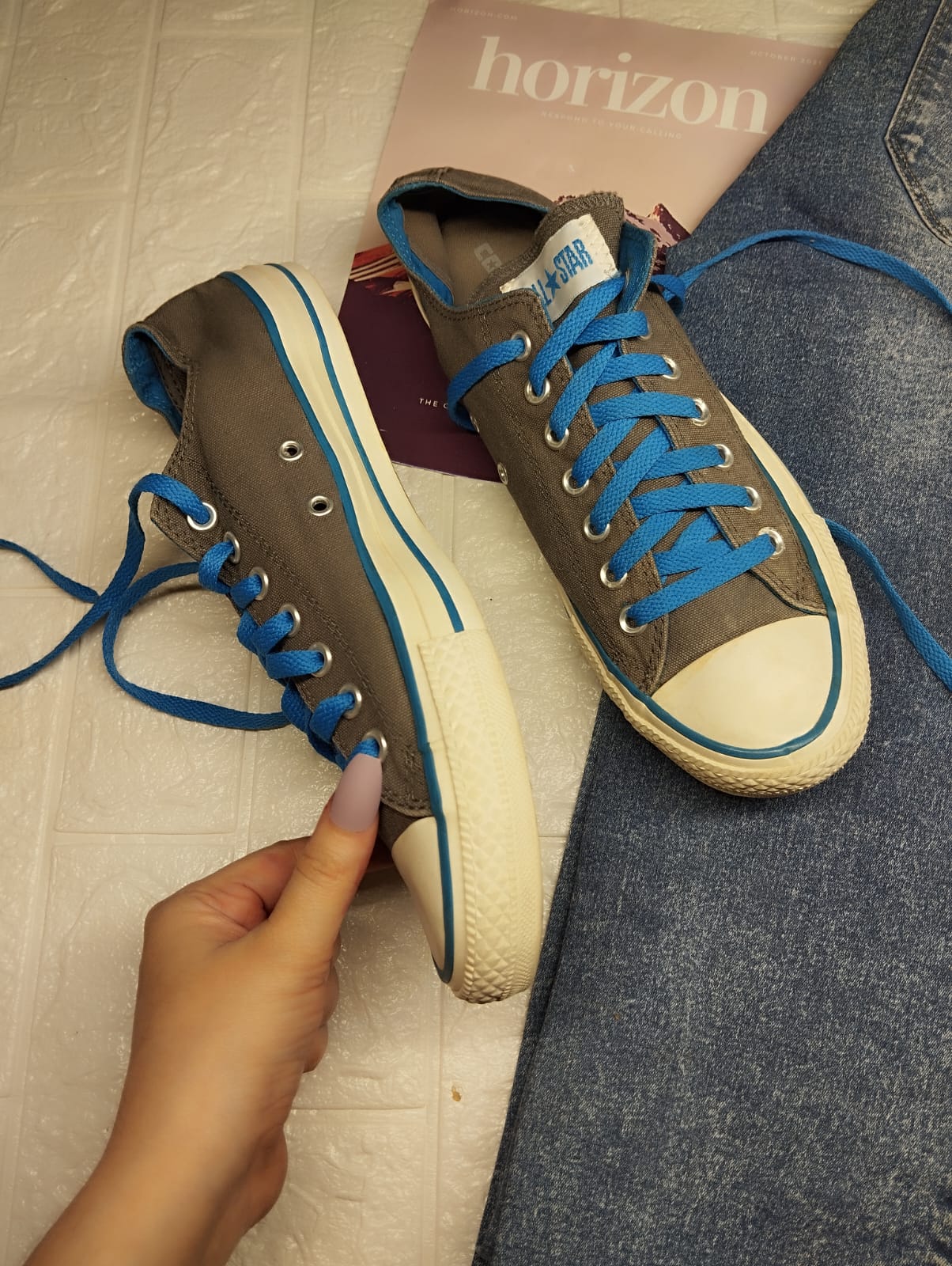 Grey and blue low rise converse