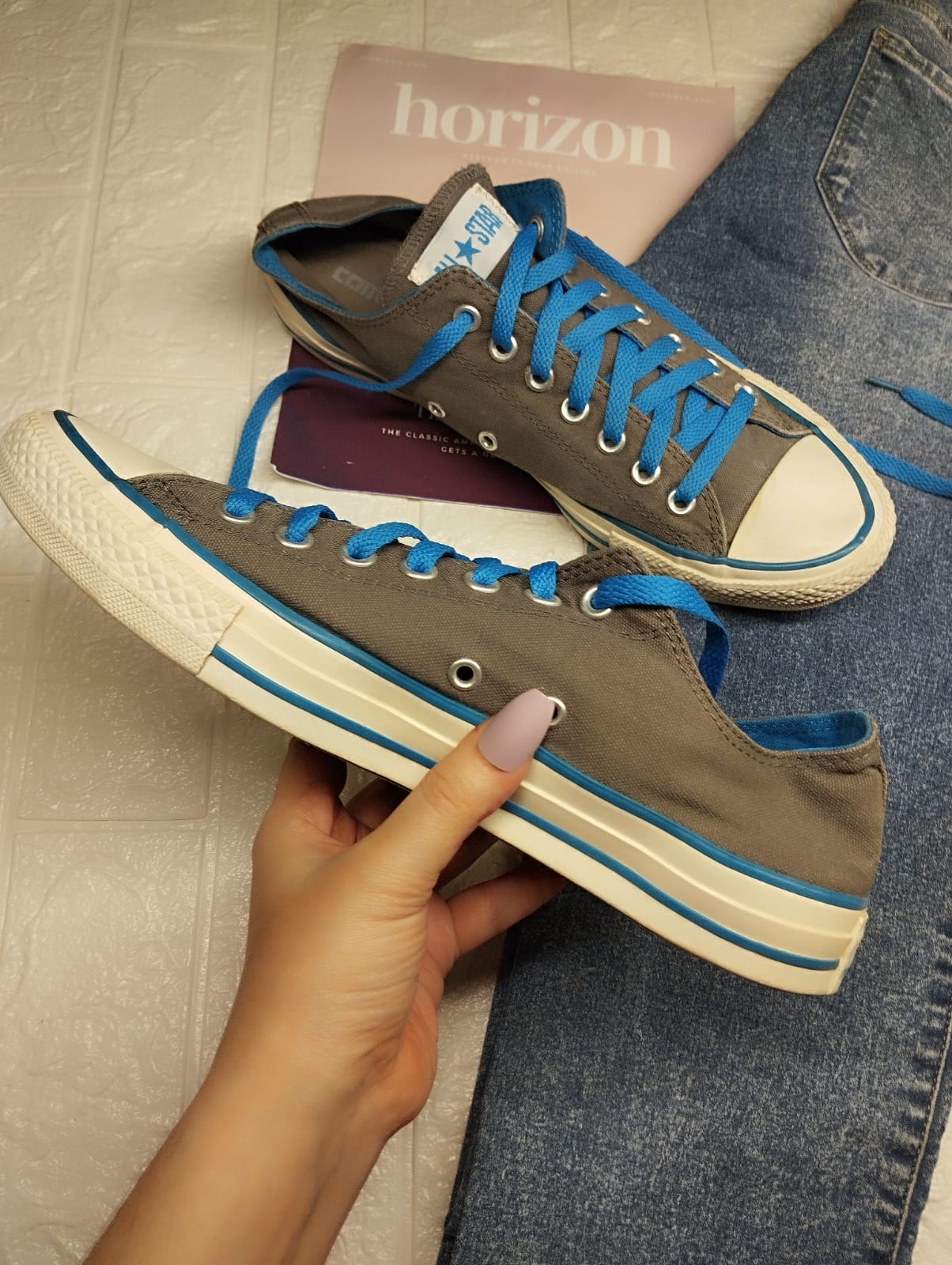 Grey and blue low rise converse