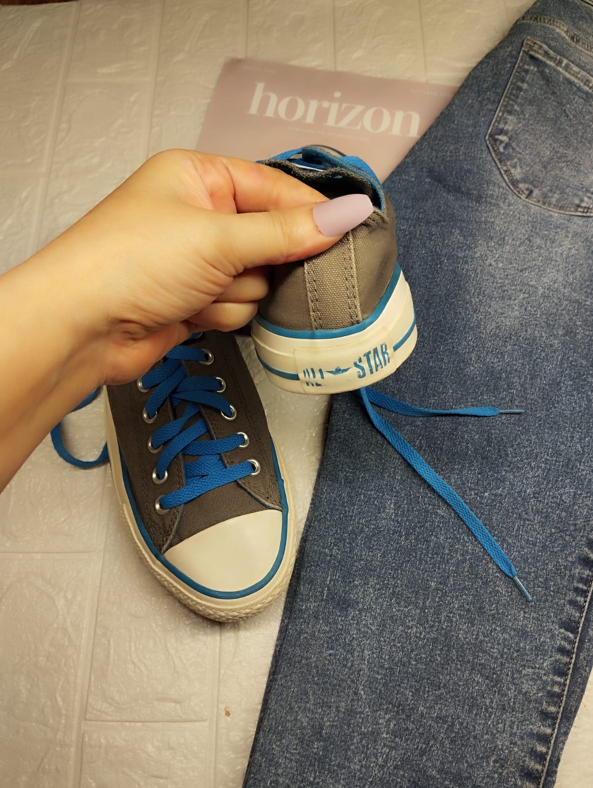 Grey and blue low rise converse