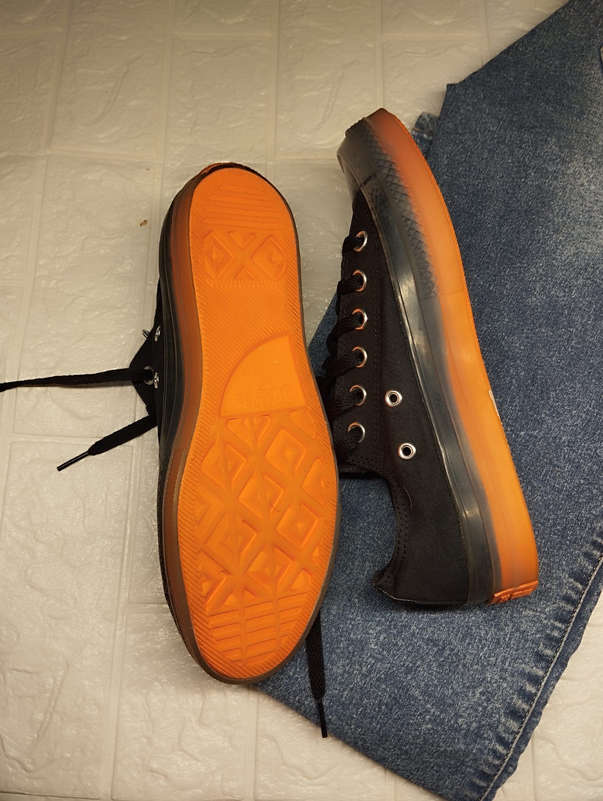 Black and orange low rise converse