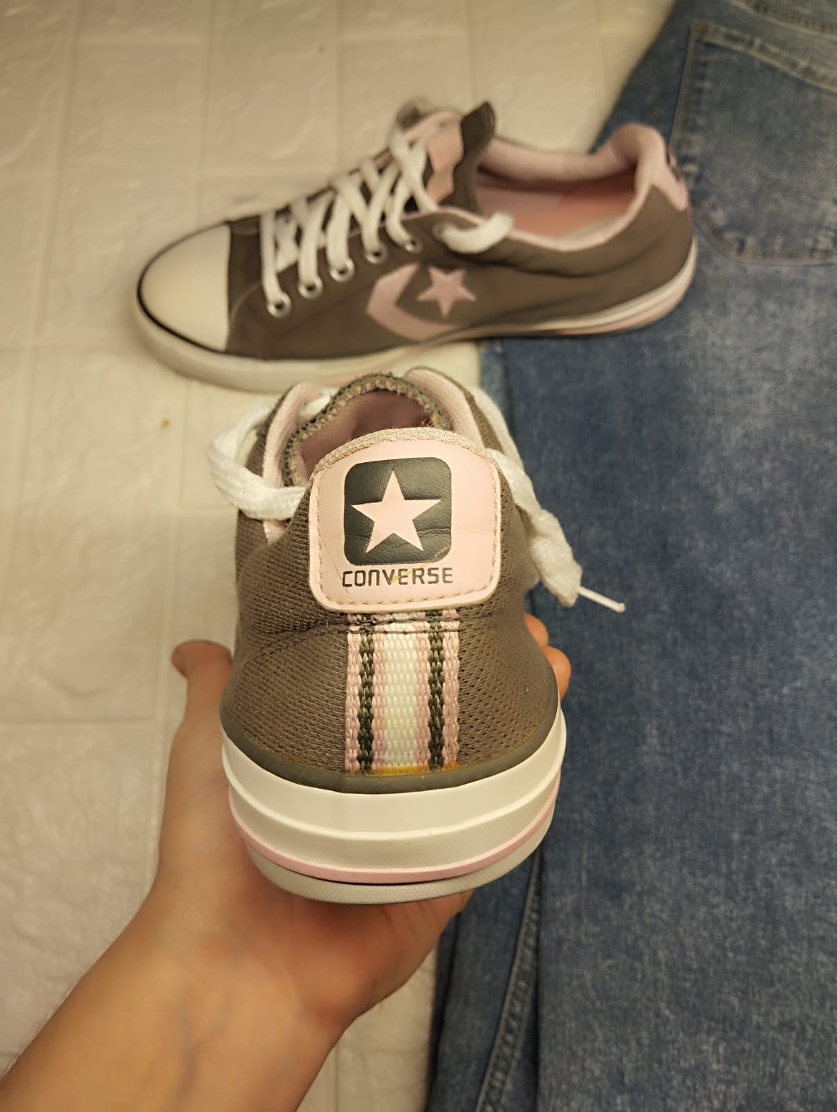 Grey and pink low rise converse