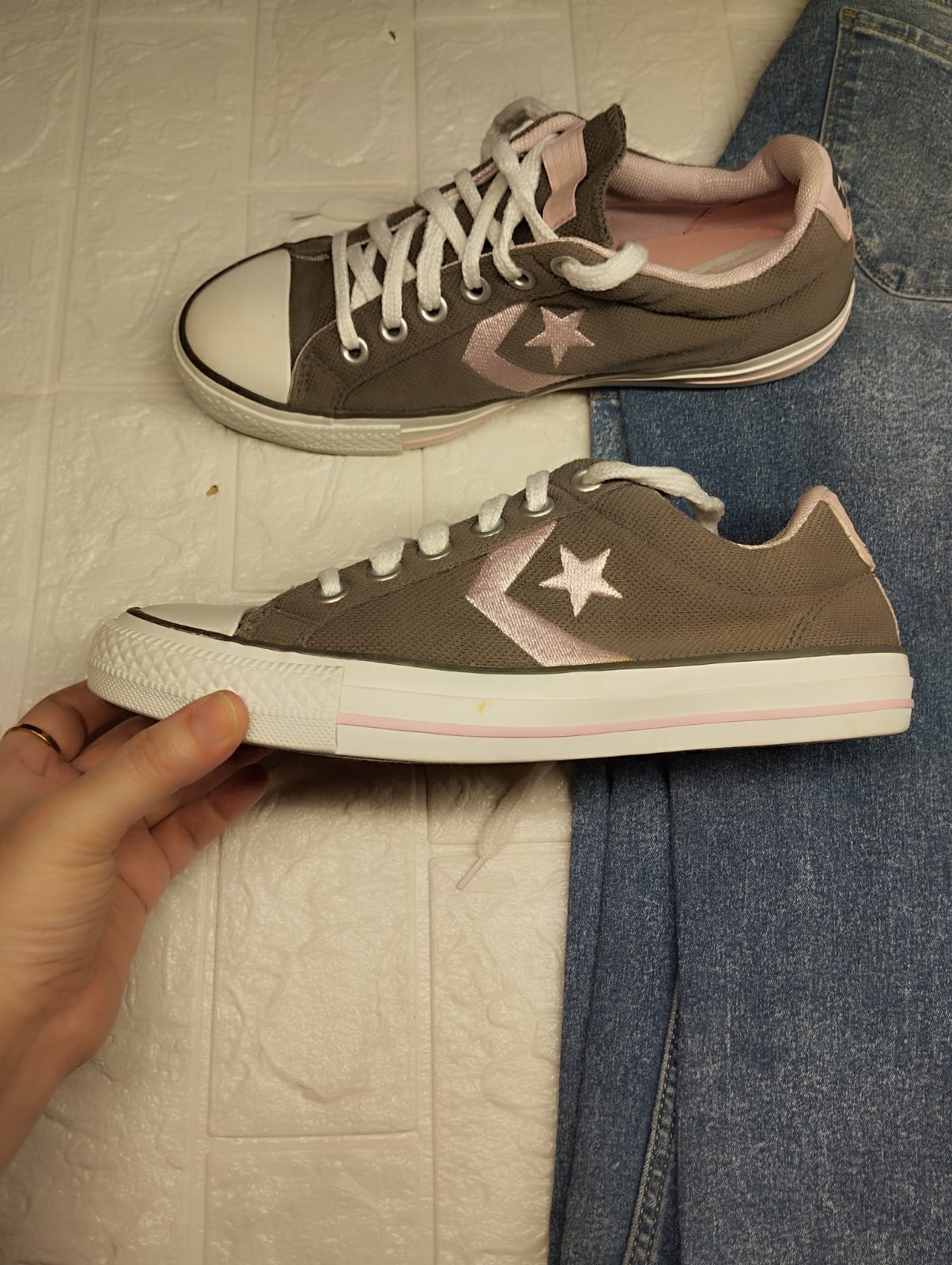 Grey and pink low rise converse