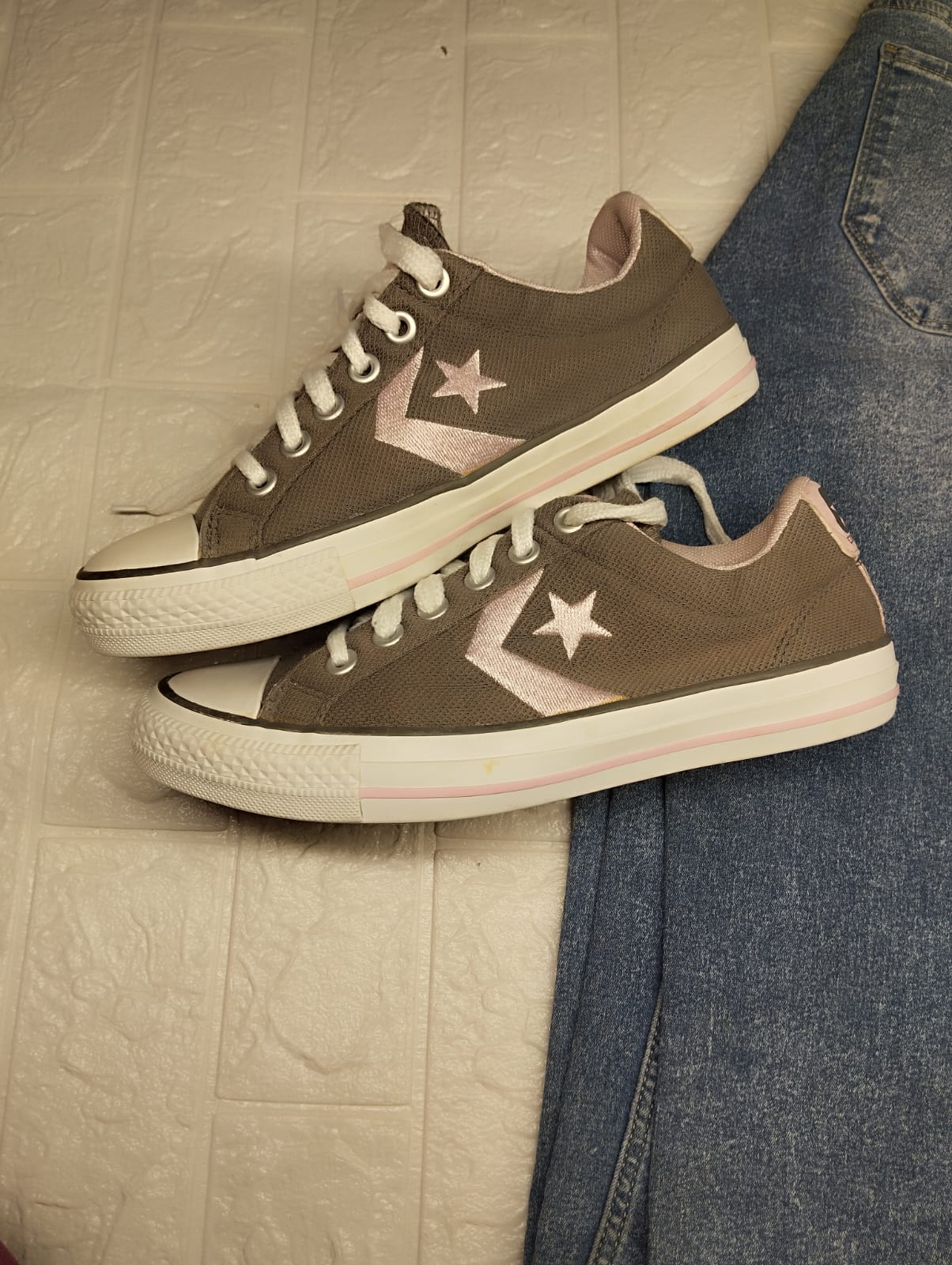 Grey and pink low rise converse