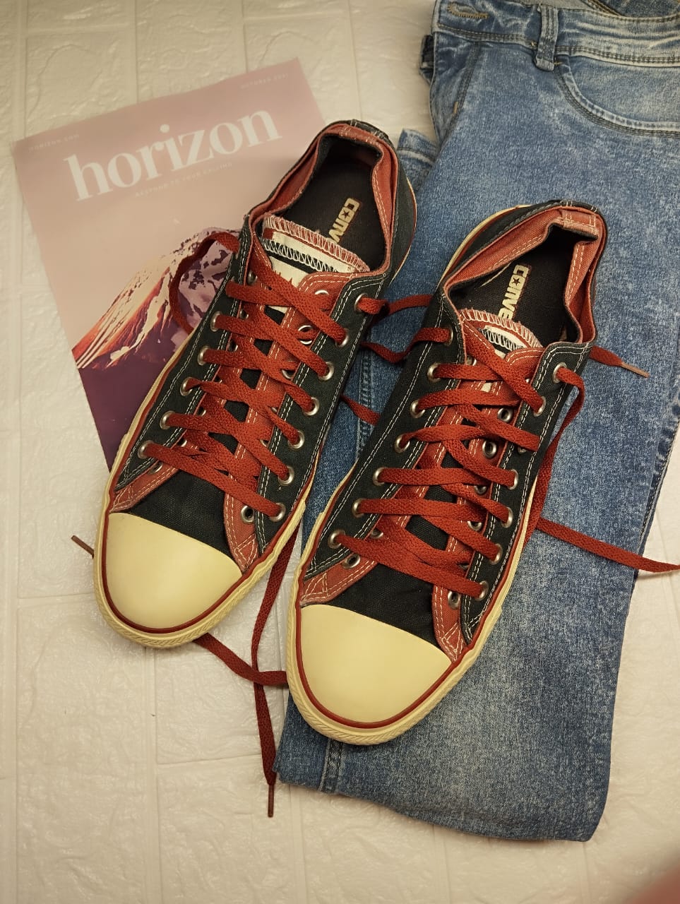 Black and orange low rise converse