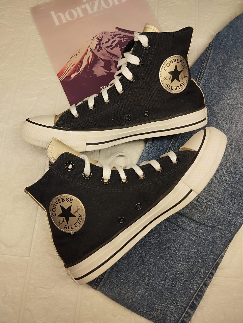 Black and silver high rise converse