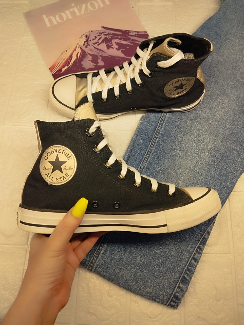 Black and silver high rise converse