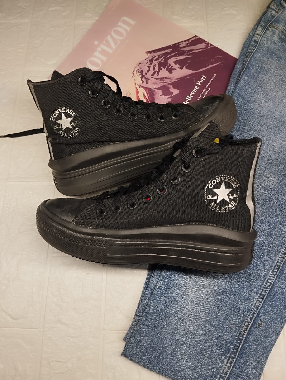 Black and silver high rise wave platform