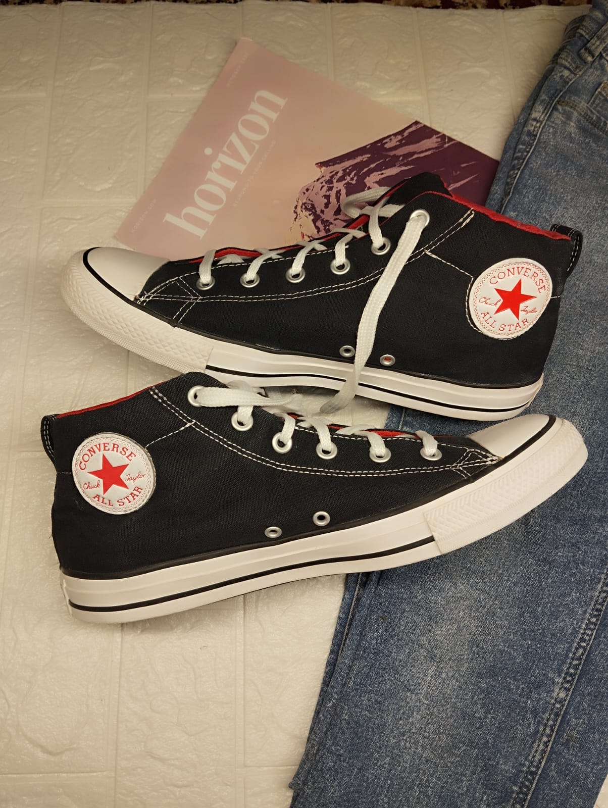 Black and red ankle cut converse