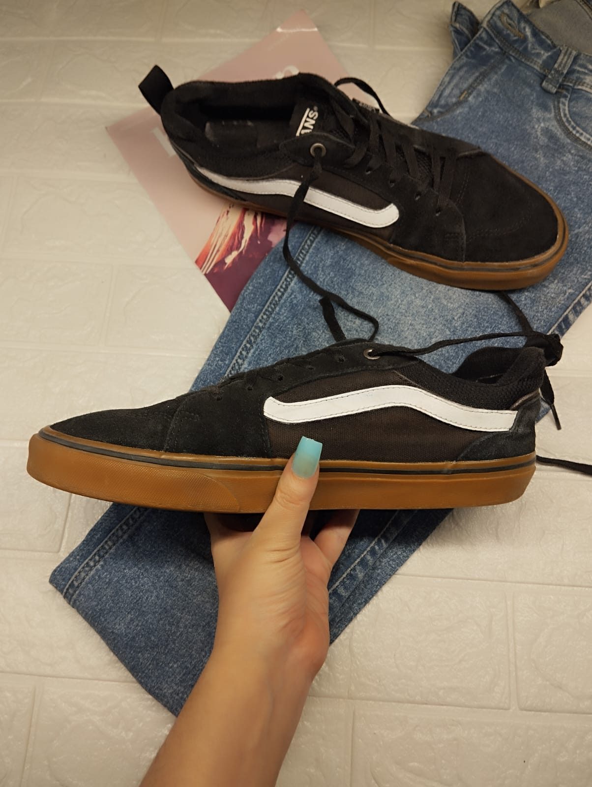 Black and brown low rise vans