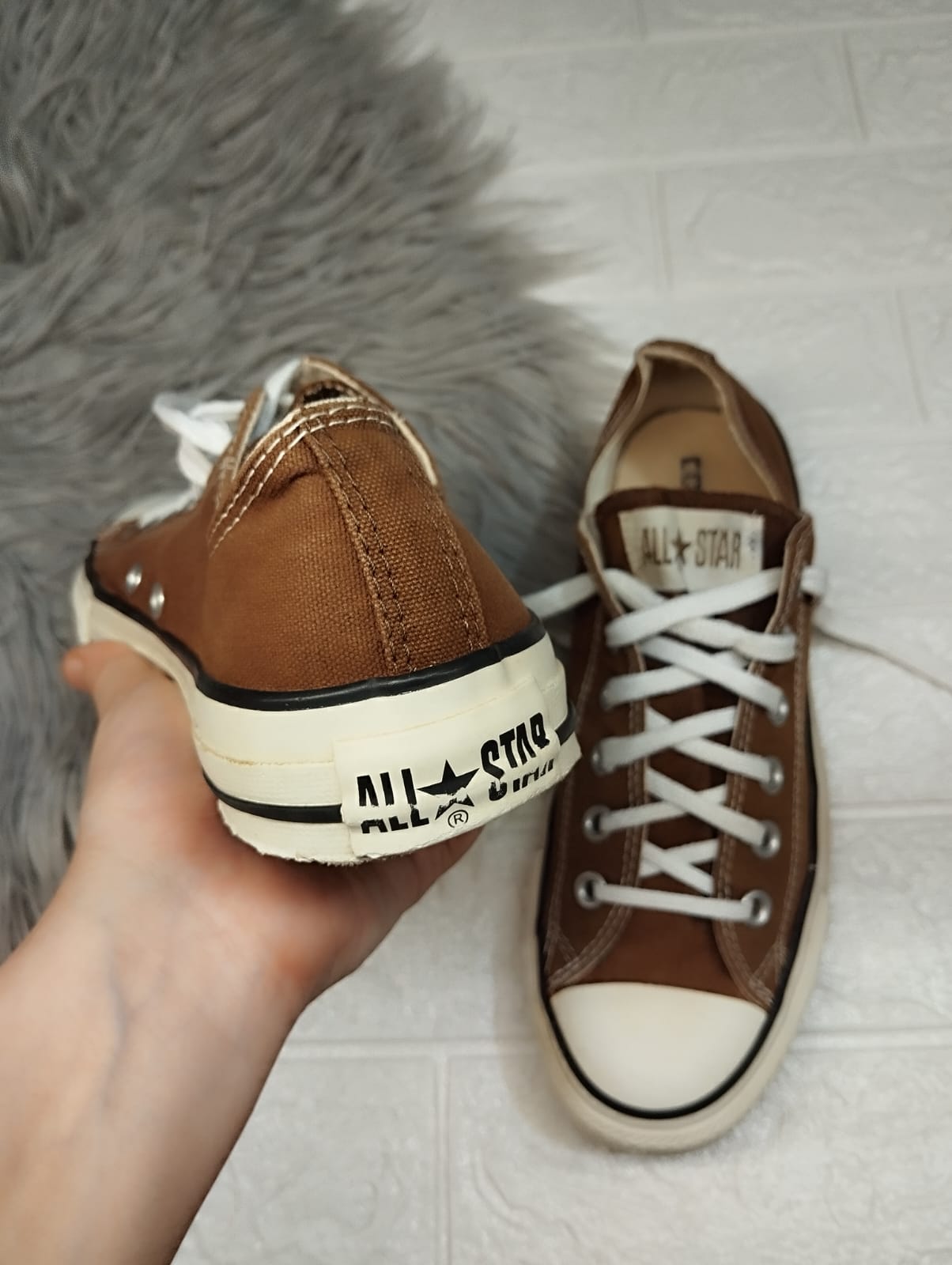Brown low rise converse