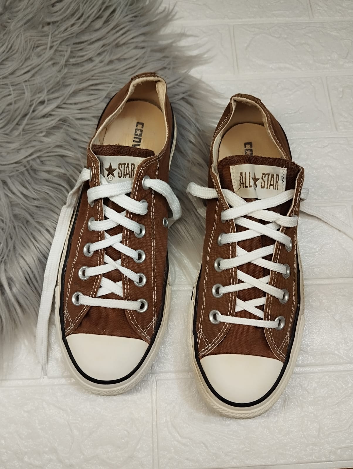 Brown low rise converse