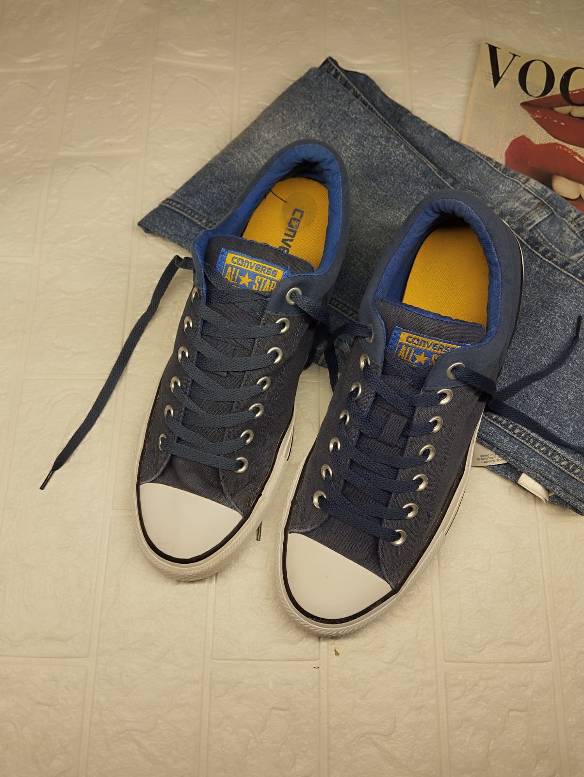 Blue and yellow low rise converse