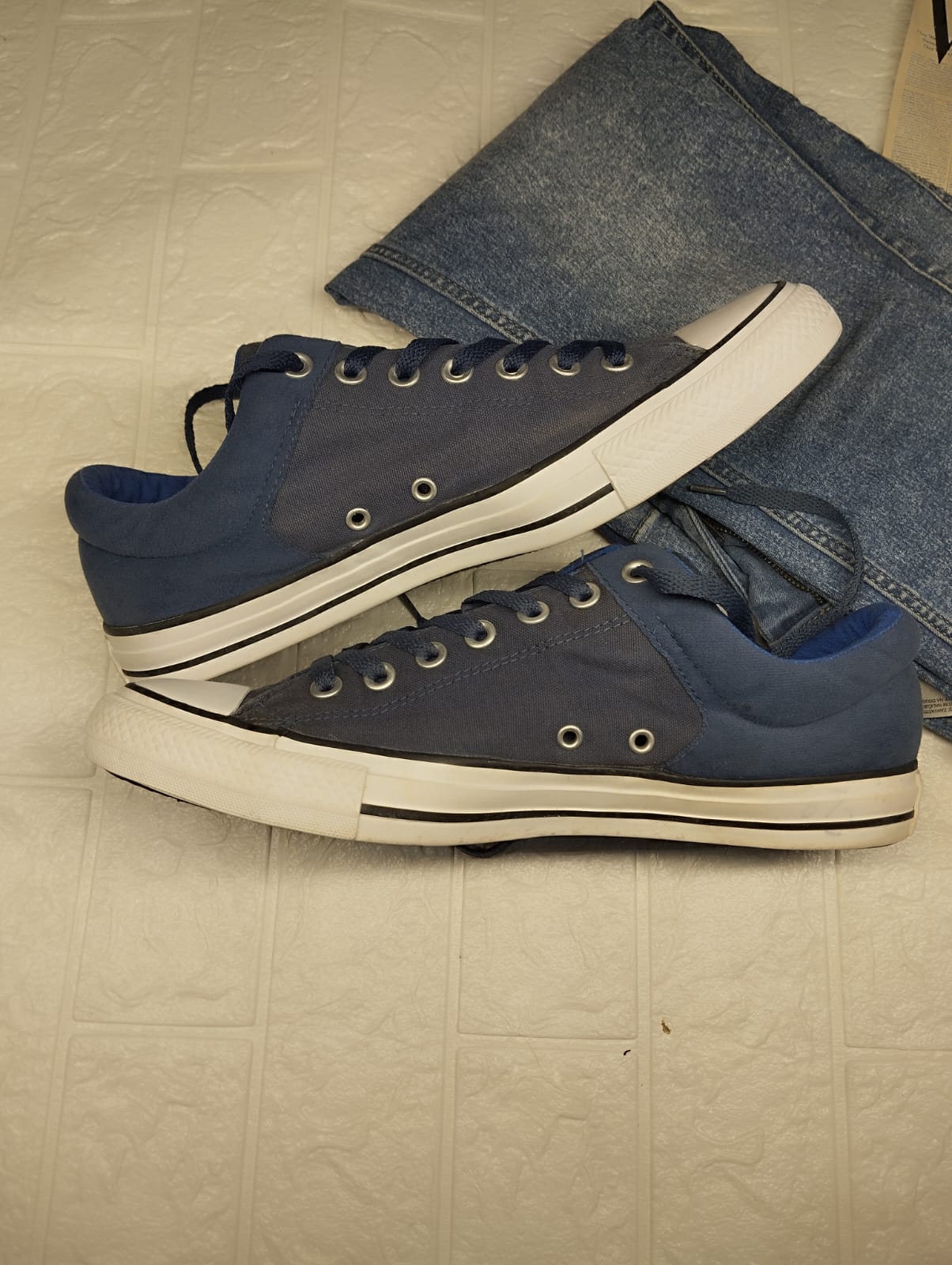 Blue and yellow low rise converse