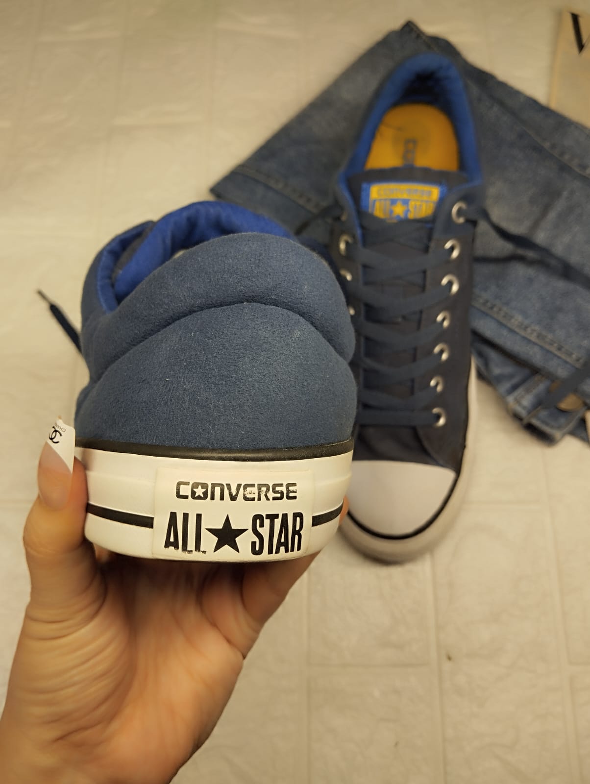 Blue and yellow low rise converse