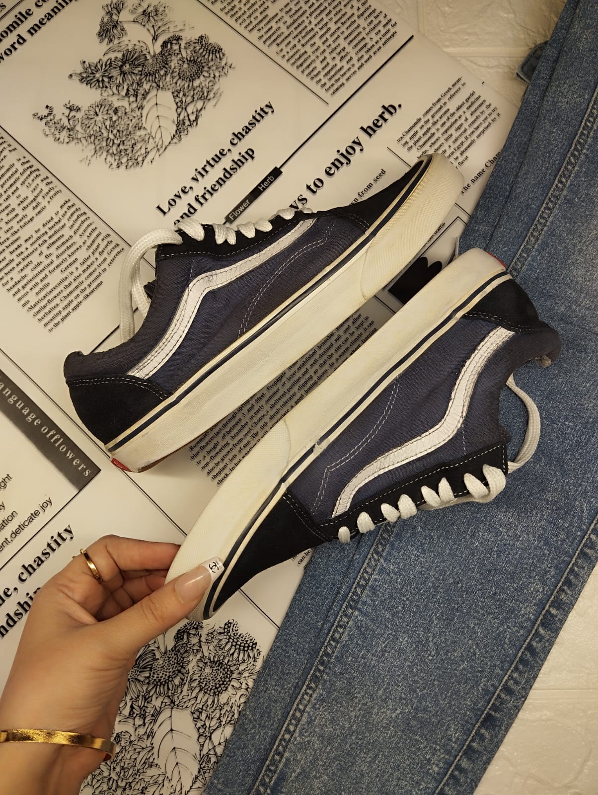Black and blue low rise vans