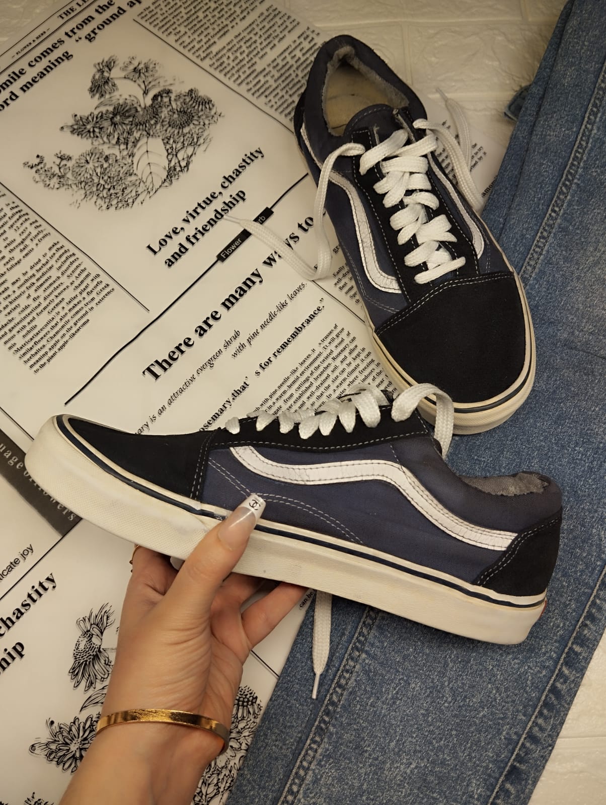 Black and blue low rise vans