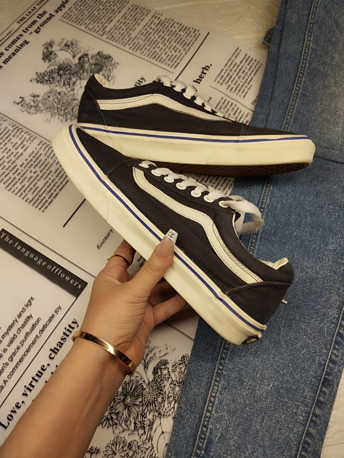 Black and blue low rise vans