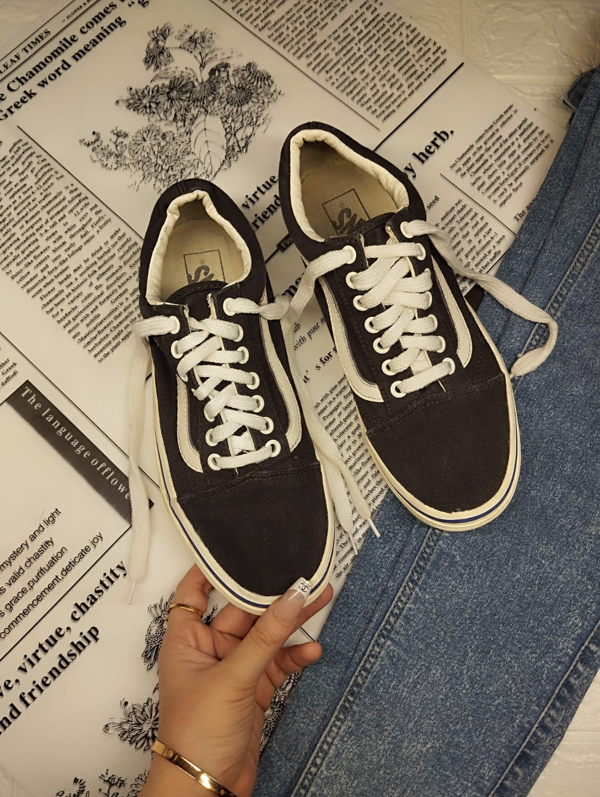 Black and blue low rise vans
