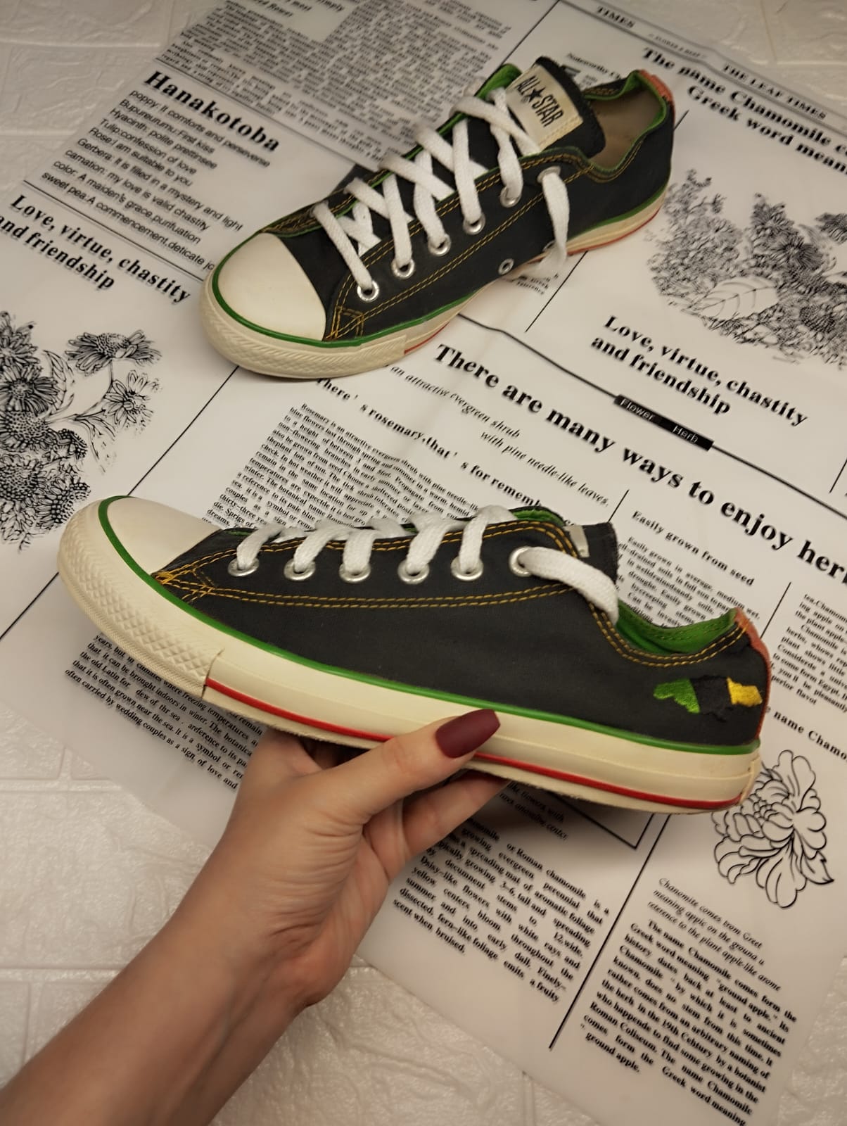 Black and green low rise converse