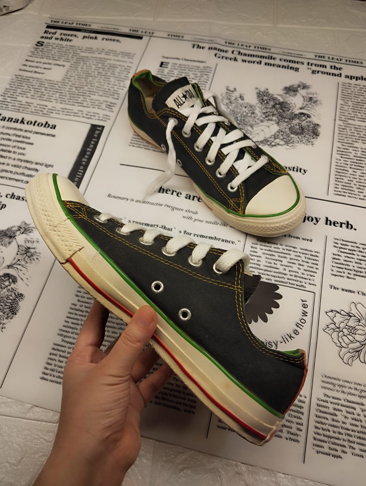 Black and green low rise converse