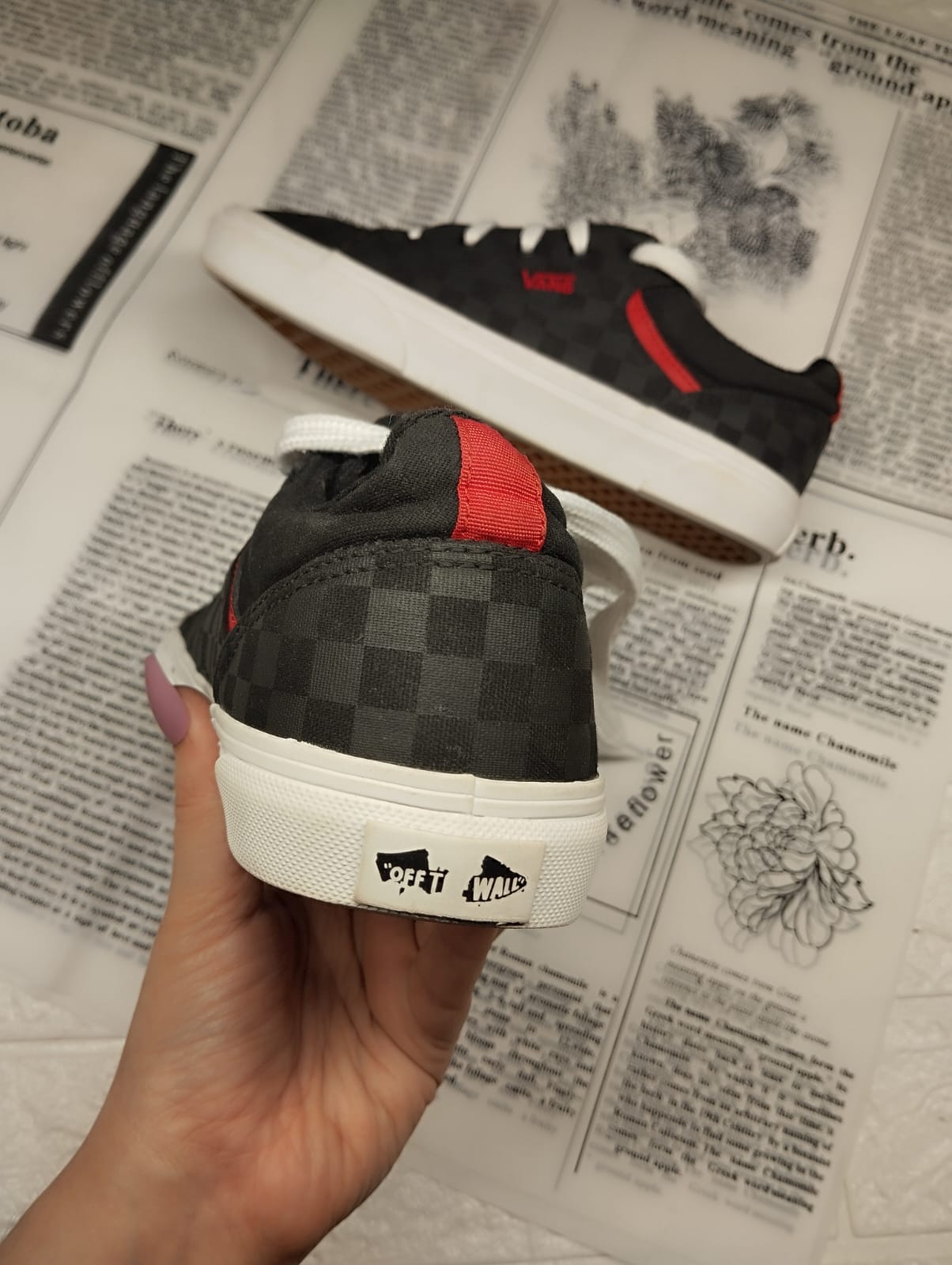 Black and red checkered low rise vans