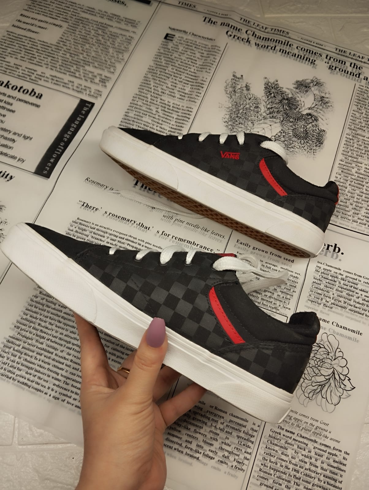 Black and red checkered low rise vans