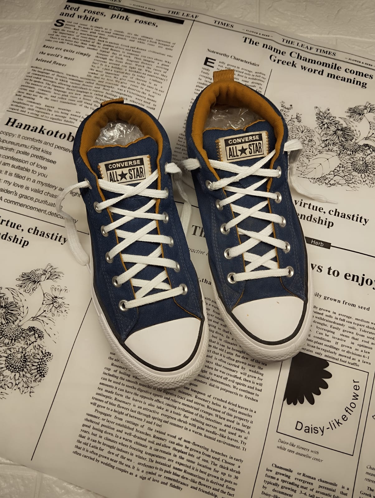 Blue and yellow ankle cut converse