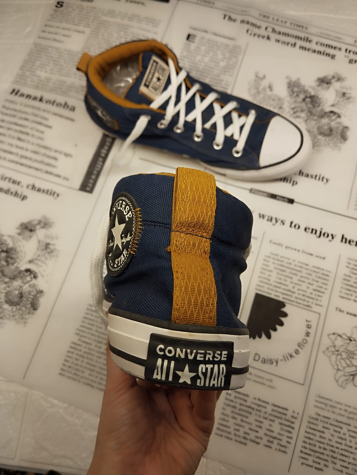 Blue and yellow ankle cut converse