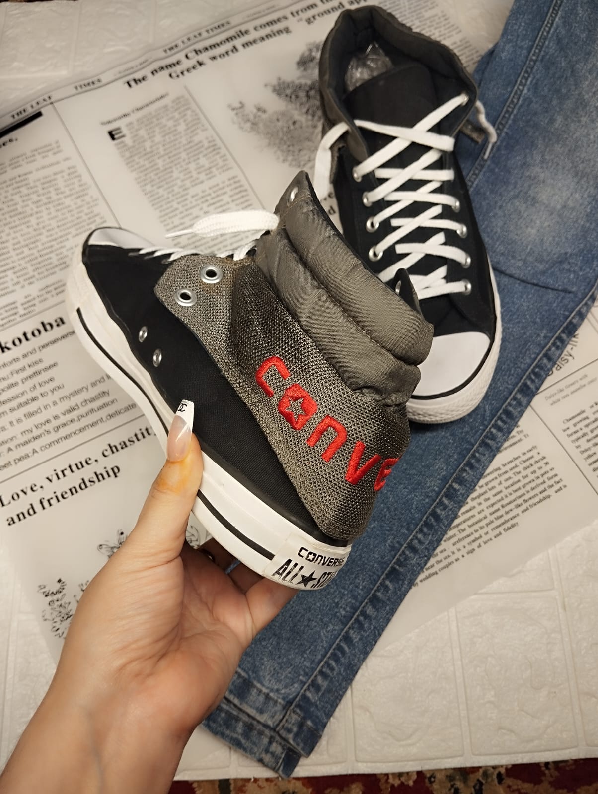 Black and red ankle cut converse