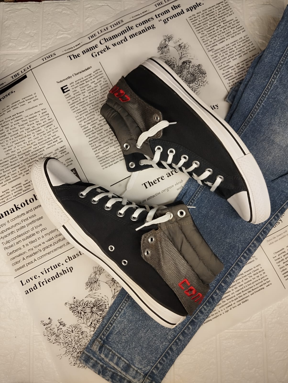 Black and red ankle cut converse