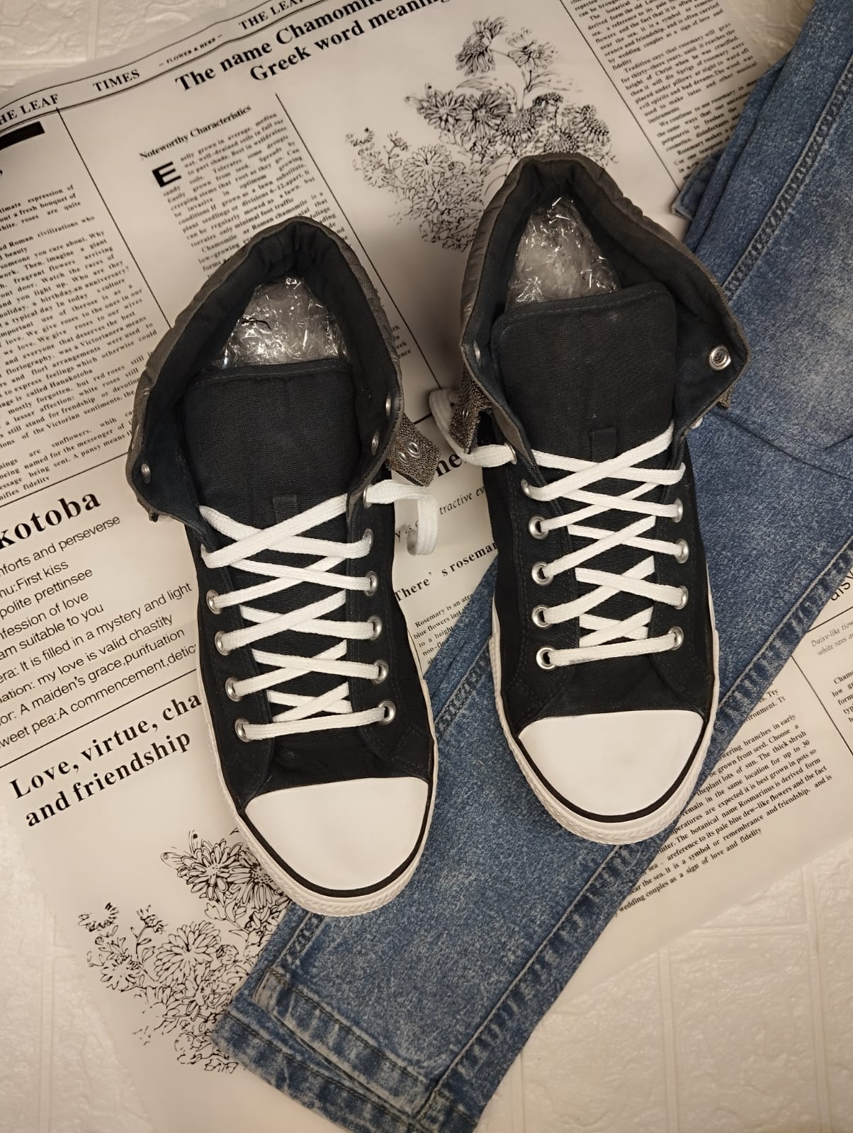Black and red ankle cut converse