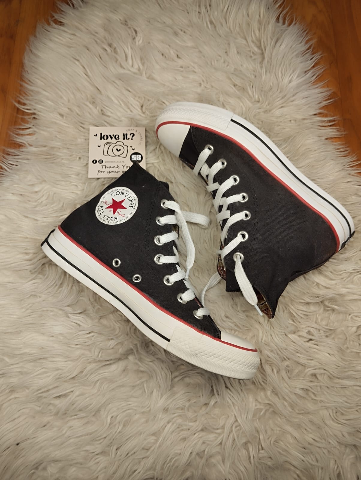 Black and red high rise converse
