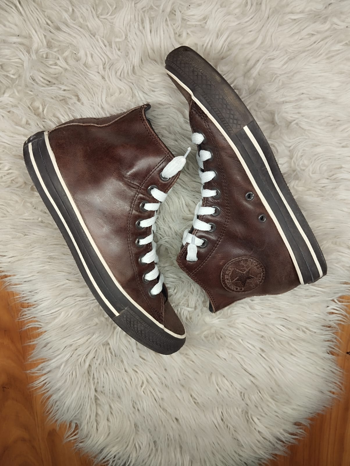 Brown leather high rise converse